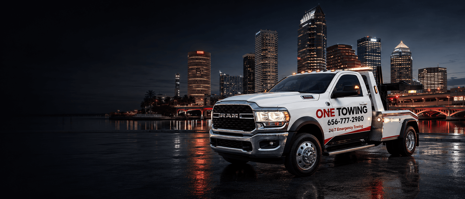 One Towing tow truck at night